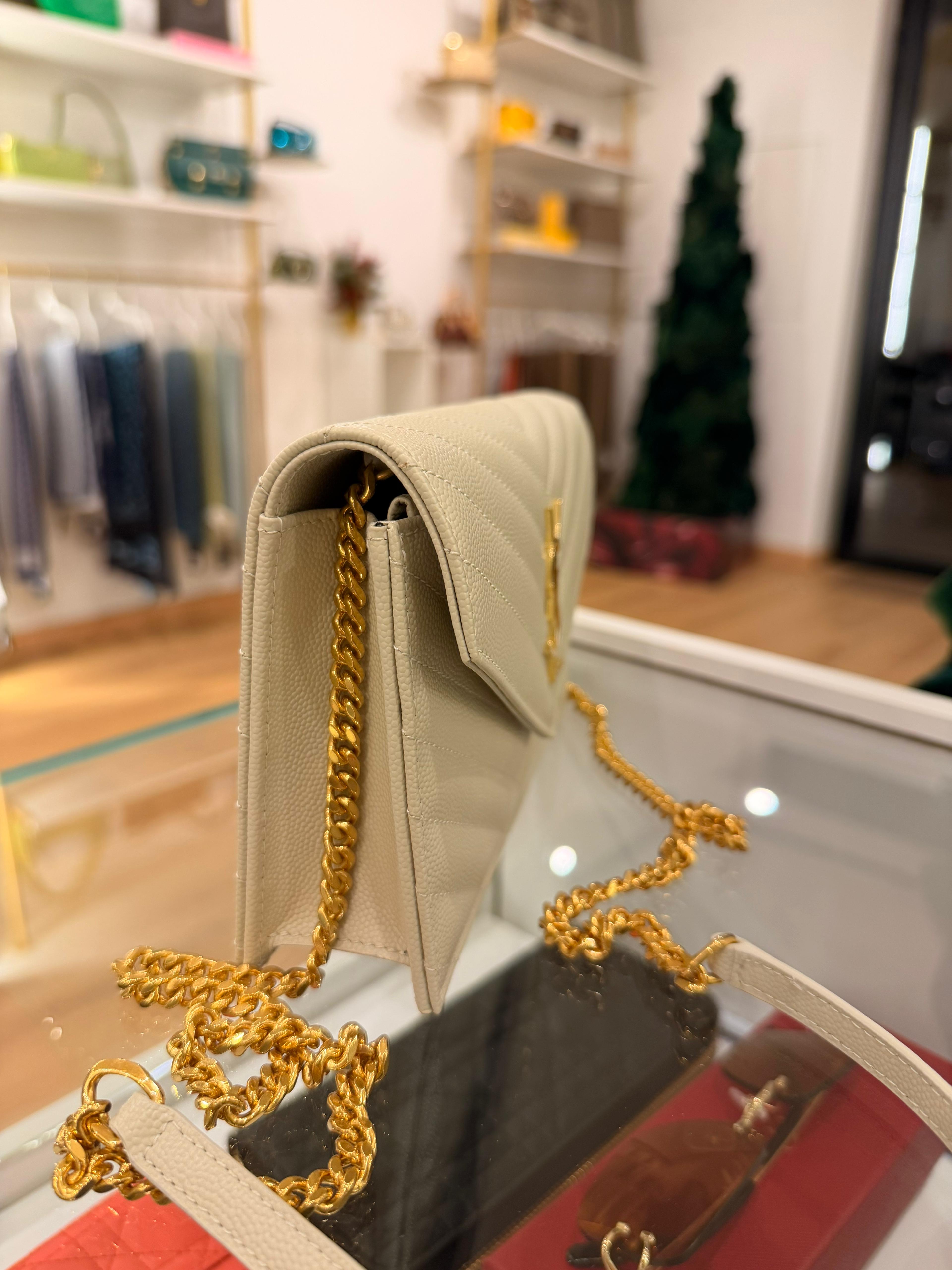 Saint Laurent Pochette Cassandre blanc vintage