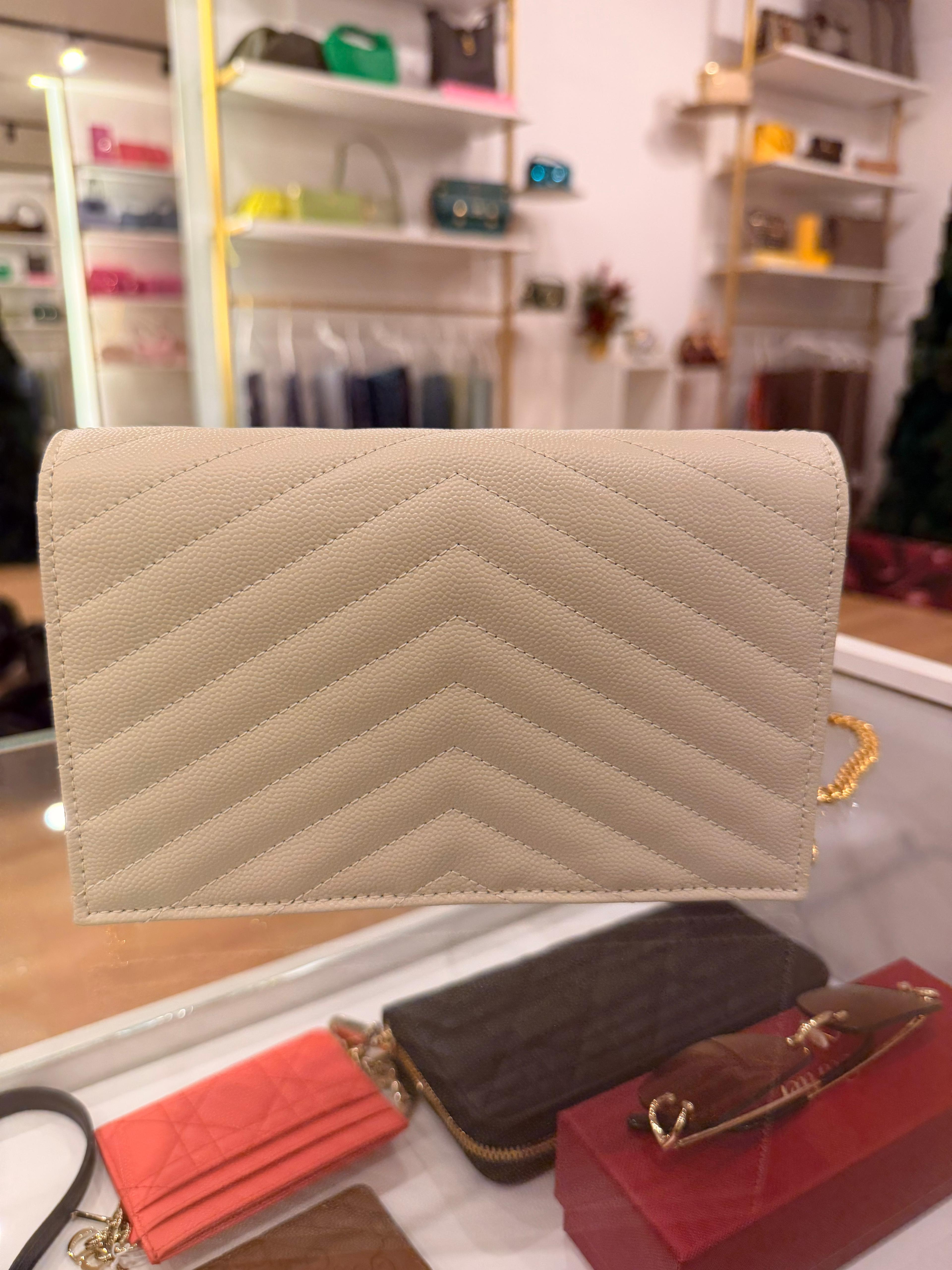 Saint Laurent Pochette Cassandre blanc vintage