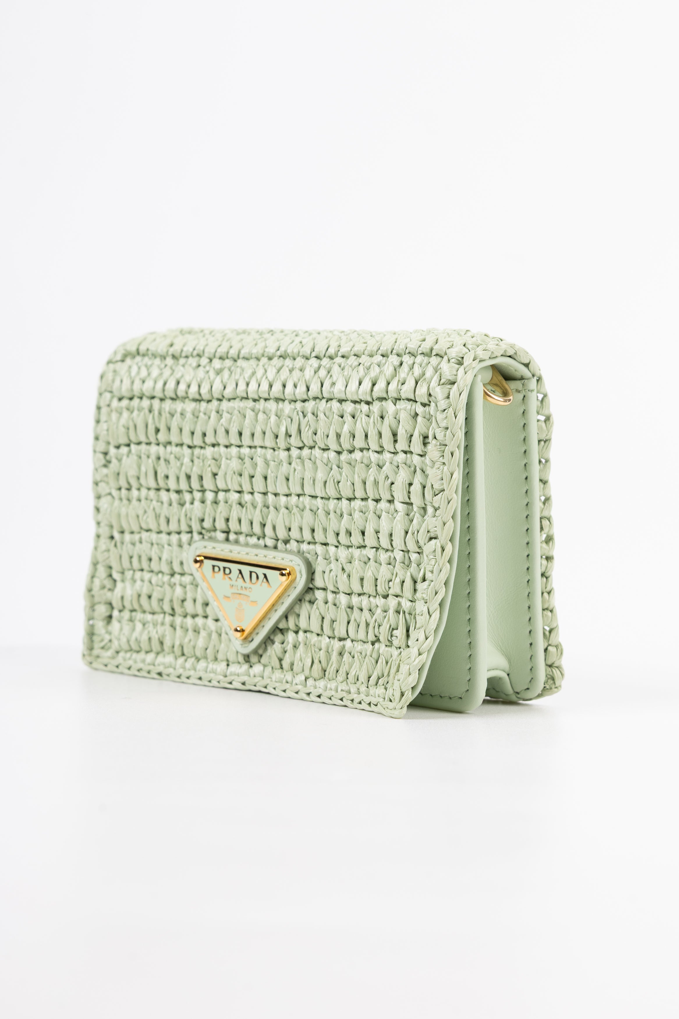 prada portacarte in rafia verde menta con tracolla