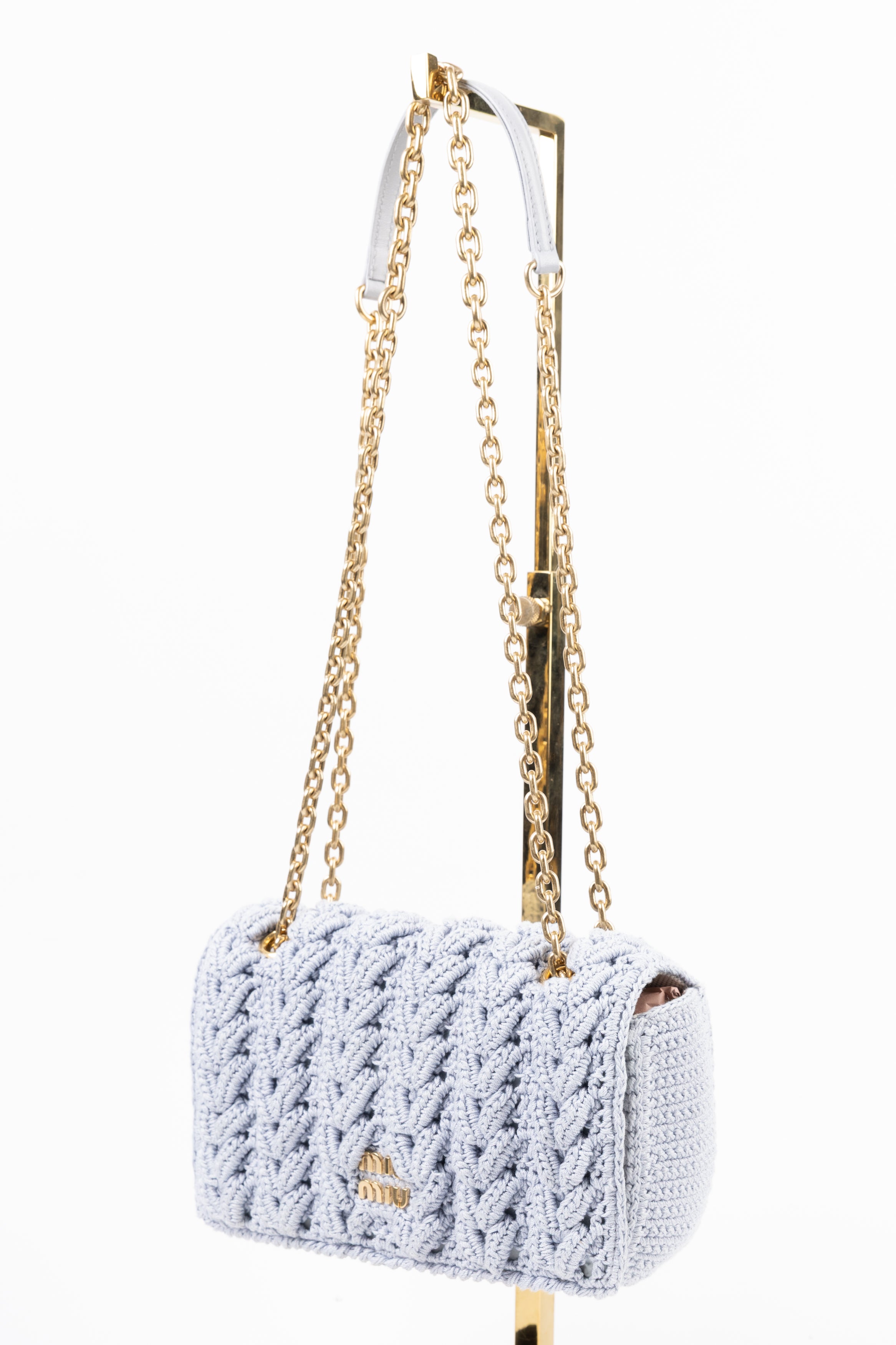 Miu Miu in Maglia con Trecce Fiordaliso