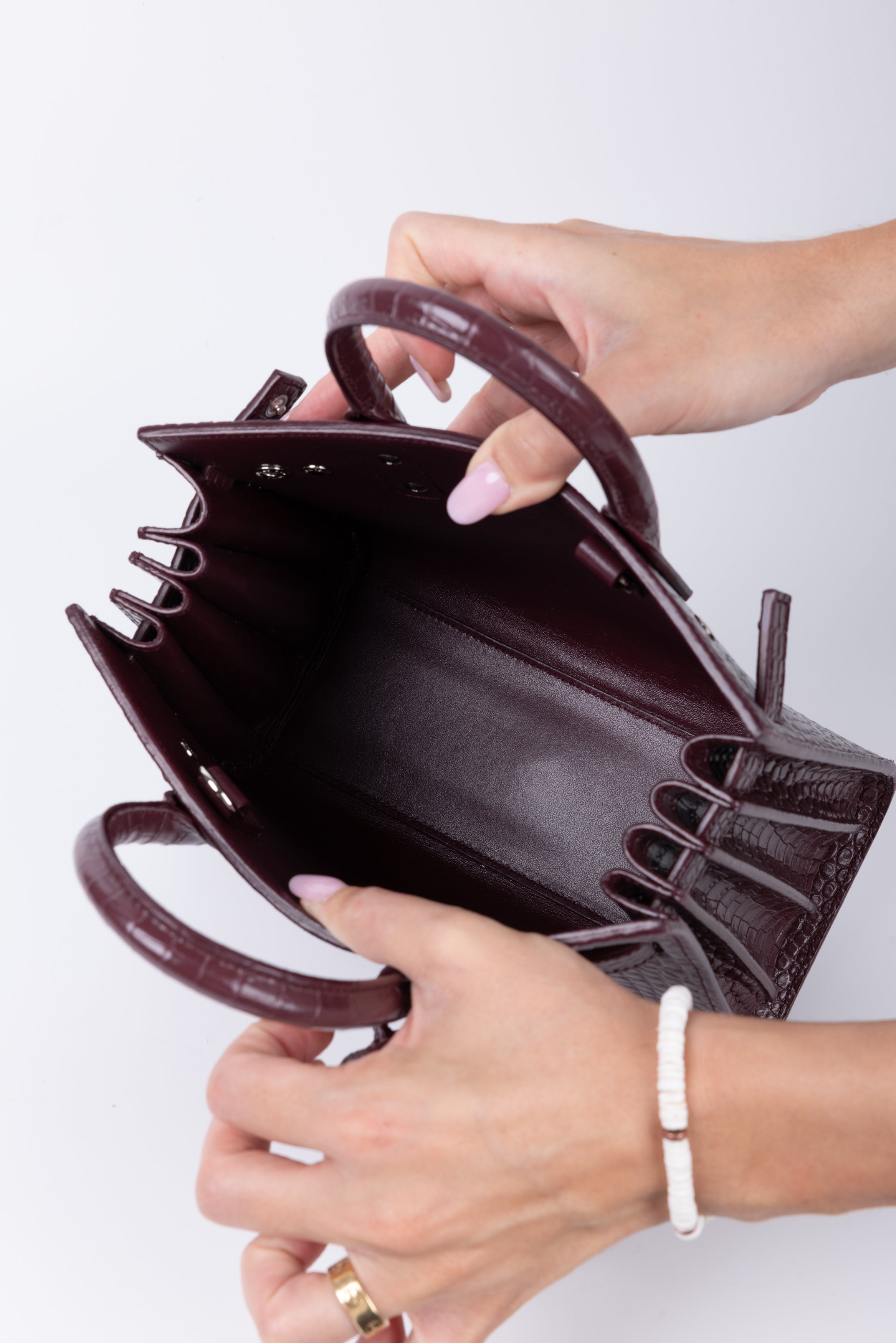 SAINT LAURENT SAC DE JOUR NANO BORDEAUX COCCO