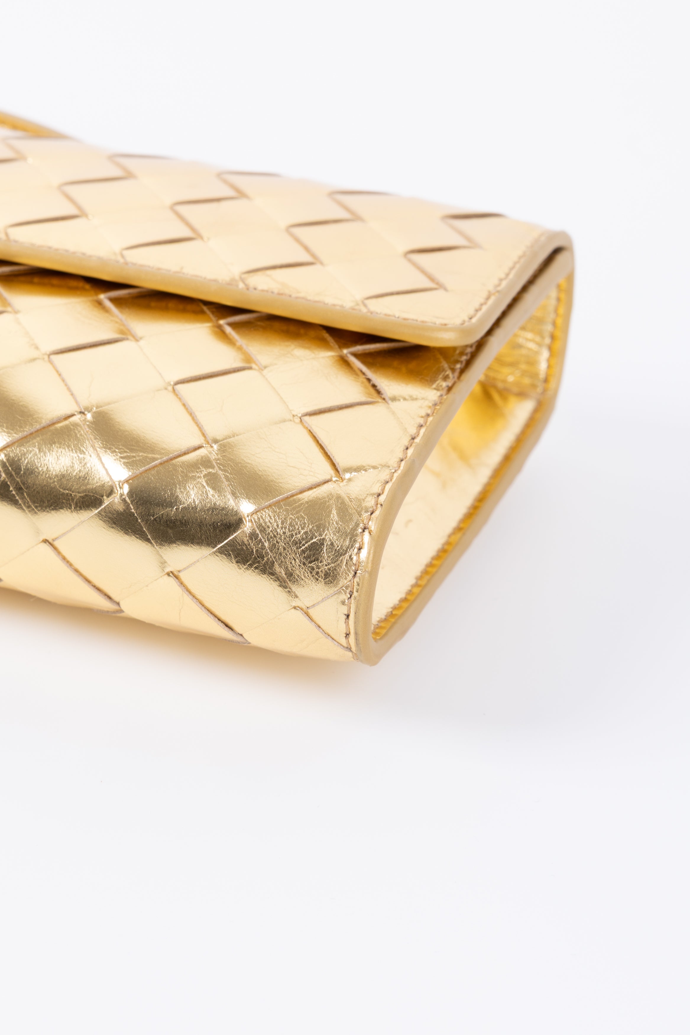 BOTTEGA VENETA ANDIAMO CLUTCH ORO LUCIDA