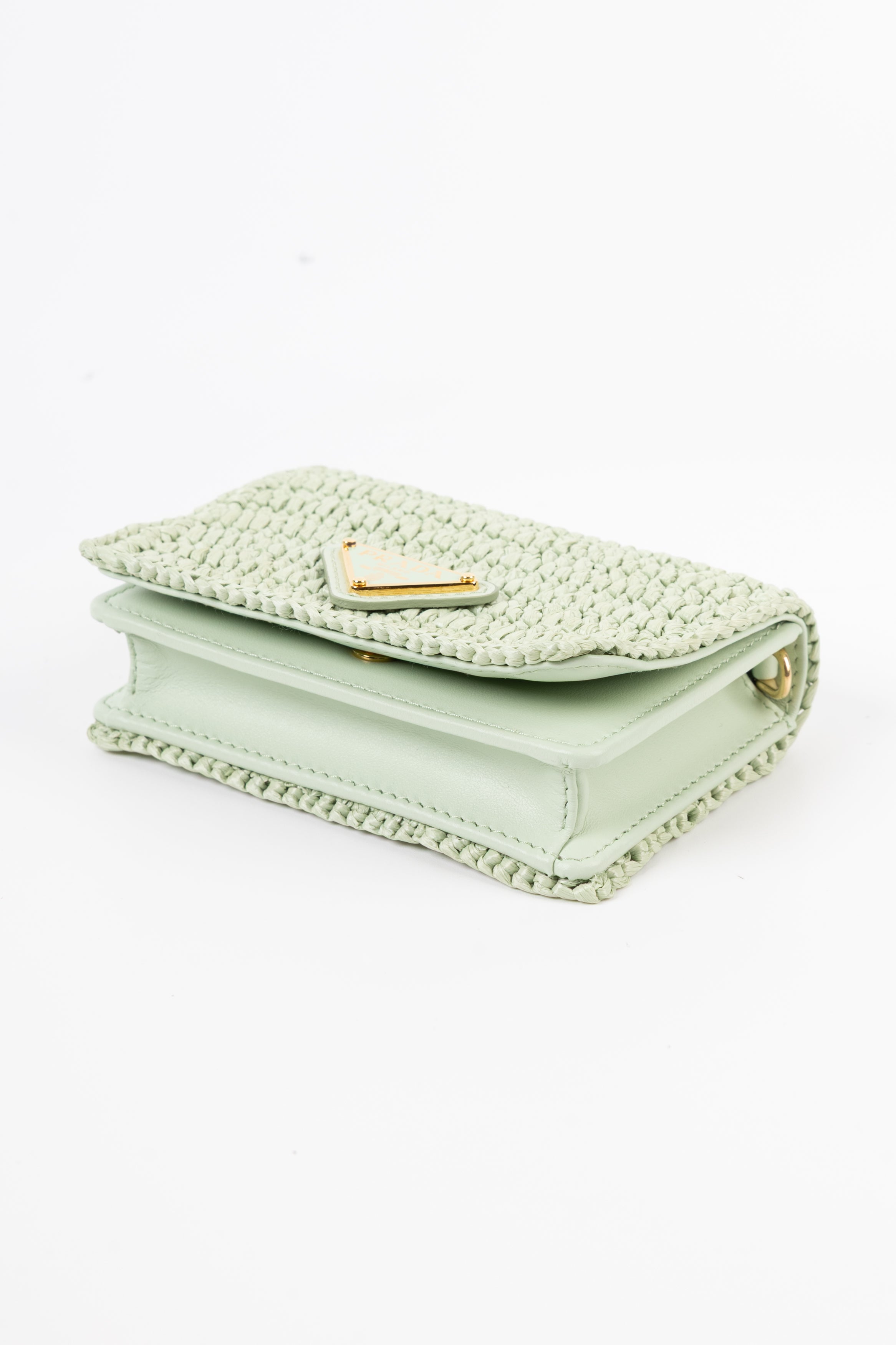 prada portacarte in rafia verde menta con tracolla