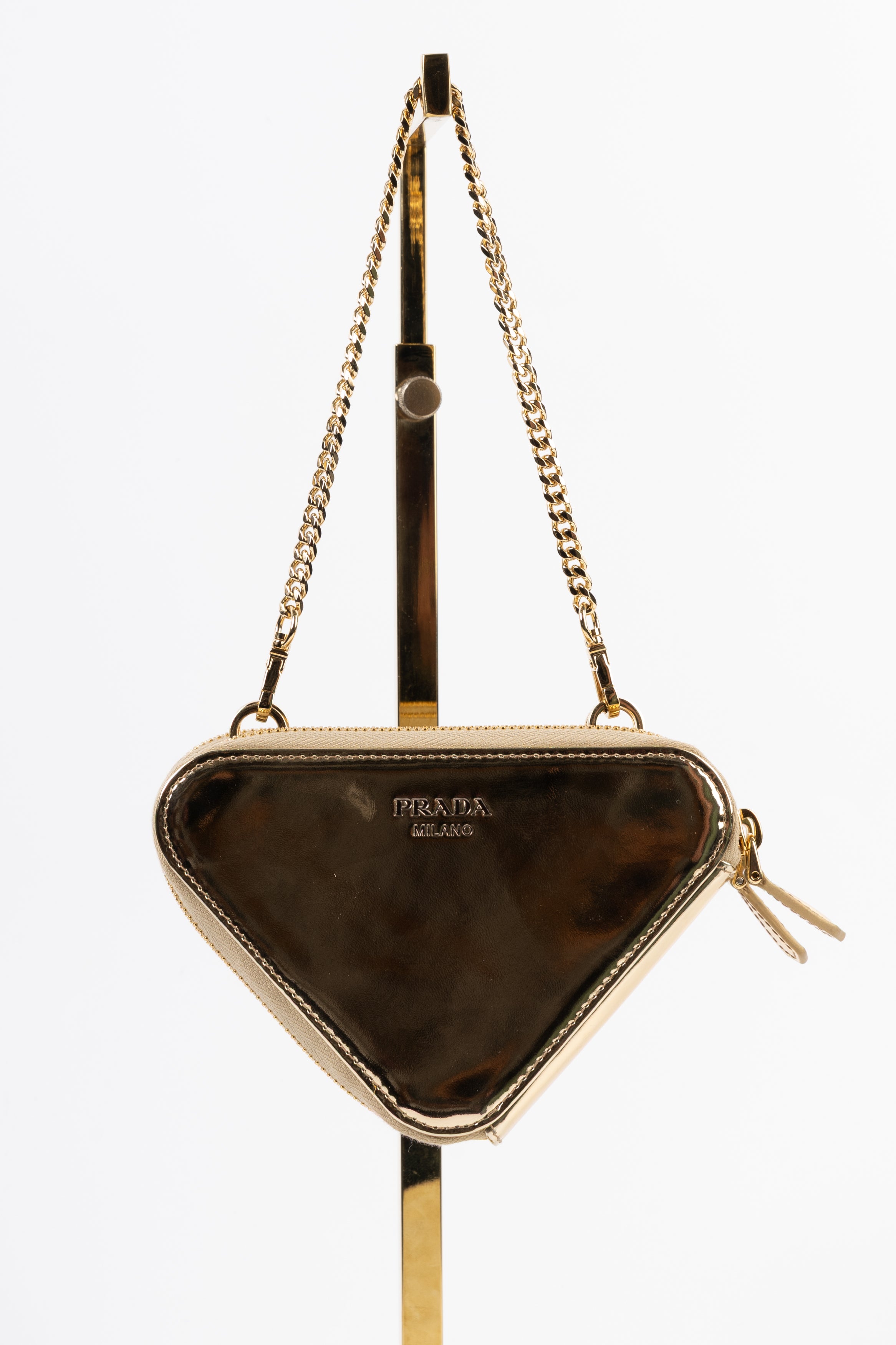 prada triangle gold con cristalli