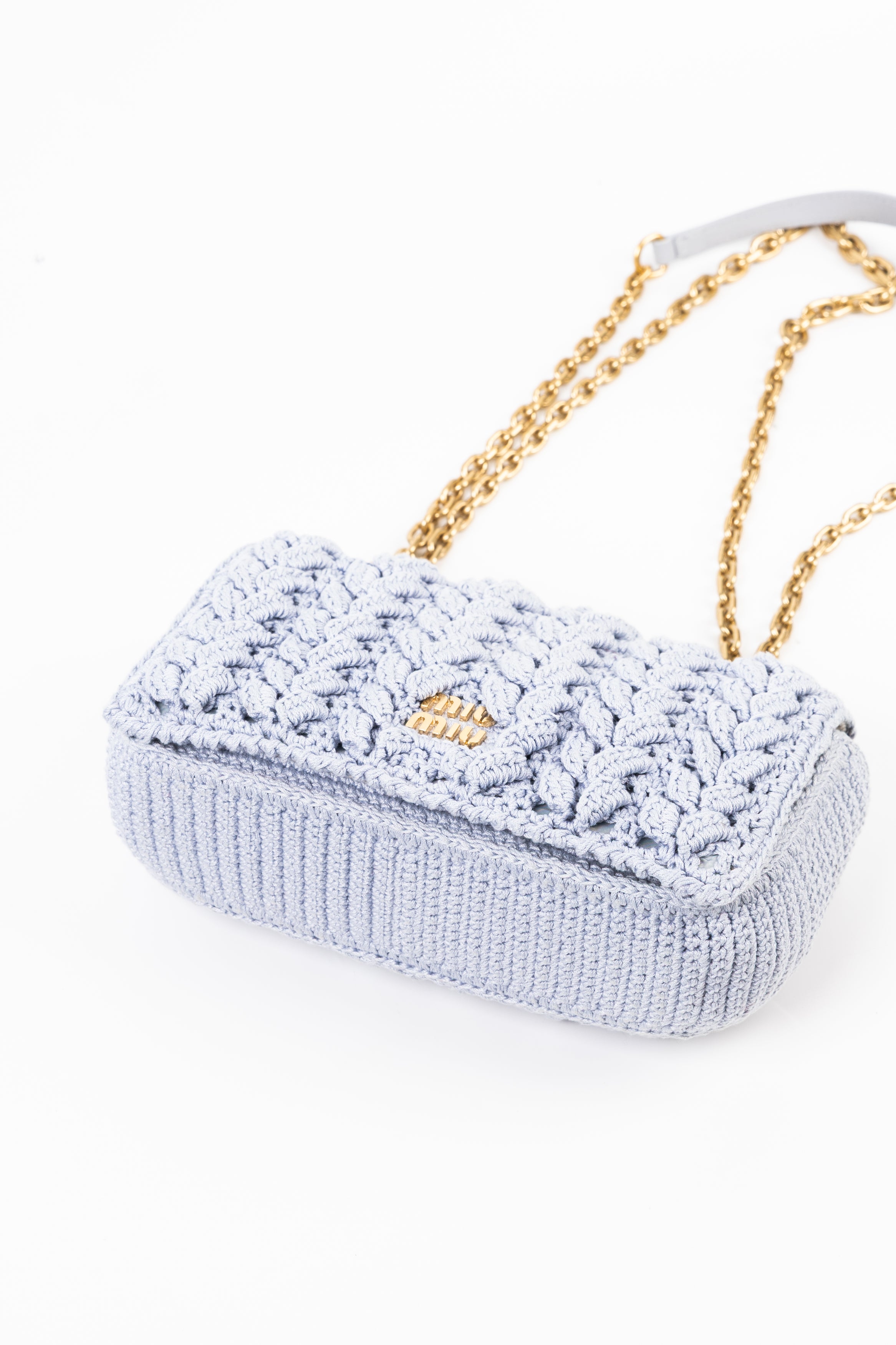 Miu Miu in Maglia con Trecce Fiordaliso